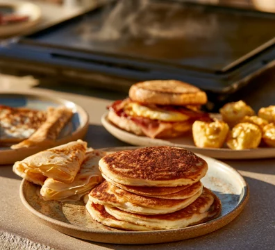Best Blackstone Breakfast Recipes featuring pancakes, crepes, egg bites, and breakfast sandwiches